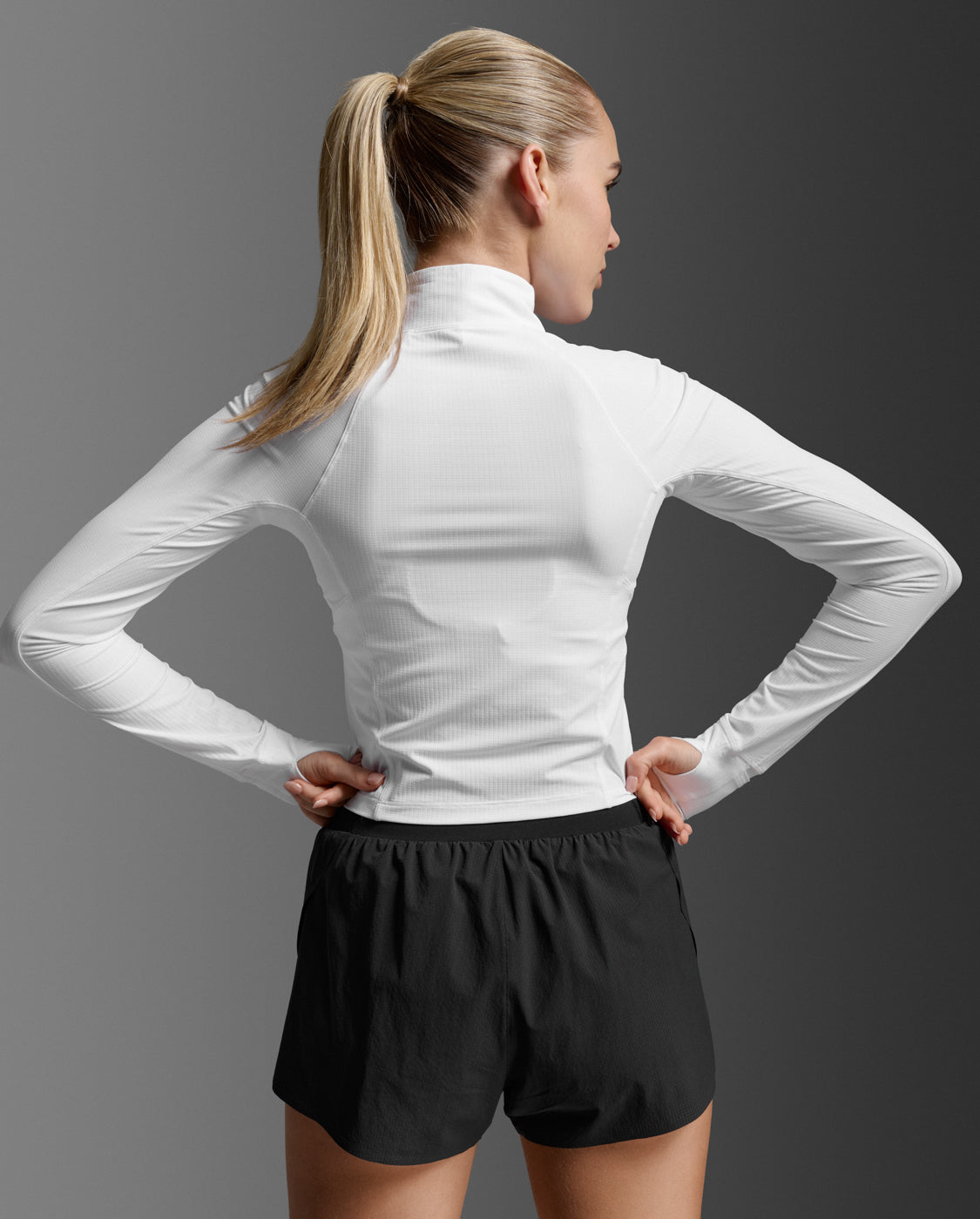 2xu-aero-waffle-1-2-zip-mezza-zip-running-donna-bianca-slim image 3