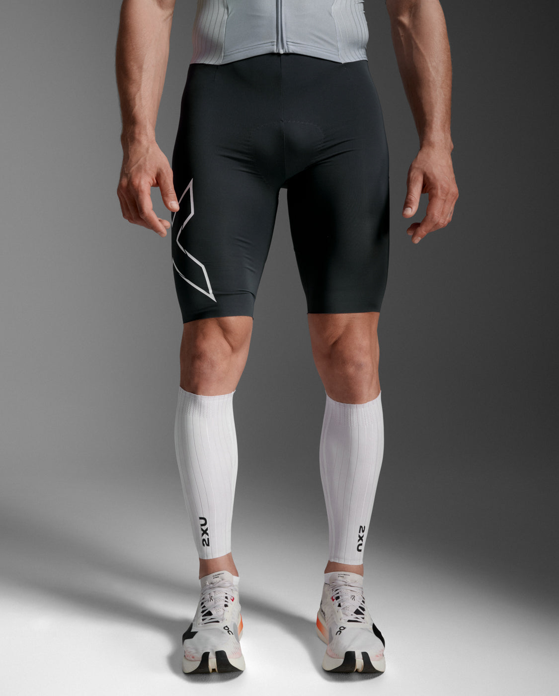 2xu-light-speed-aero-calf-guards-uomo-bianco image 1