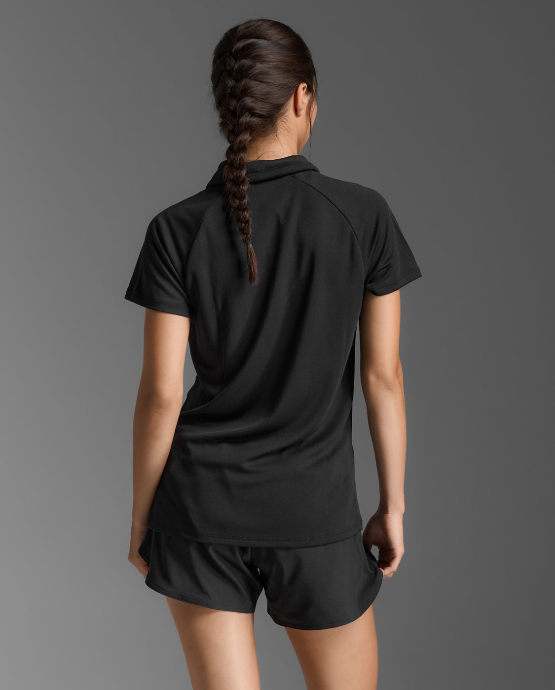 2xu-aspire-polo-donna-nera-polo-tecnica-traspirante image 2