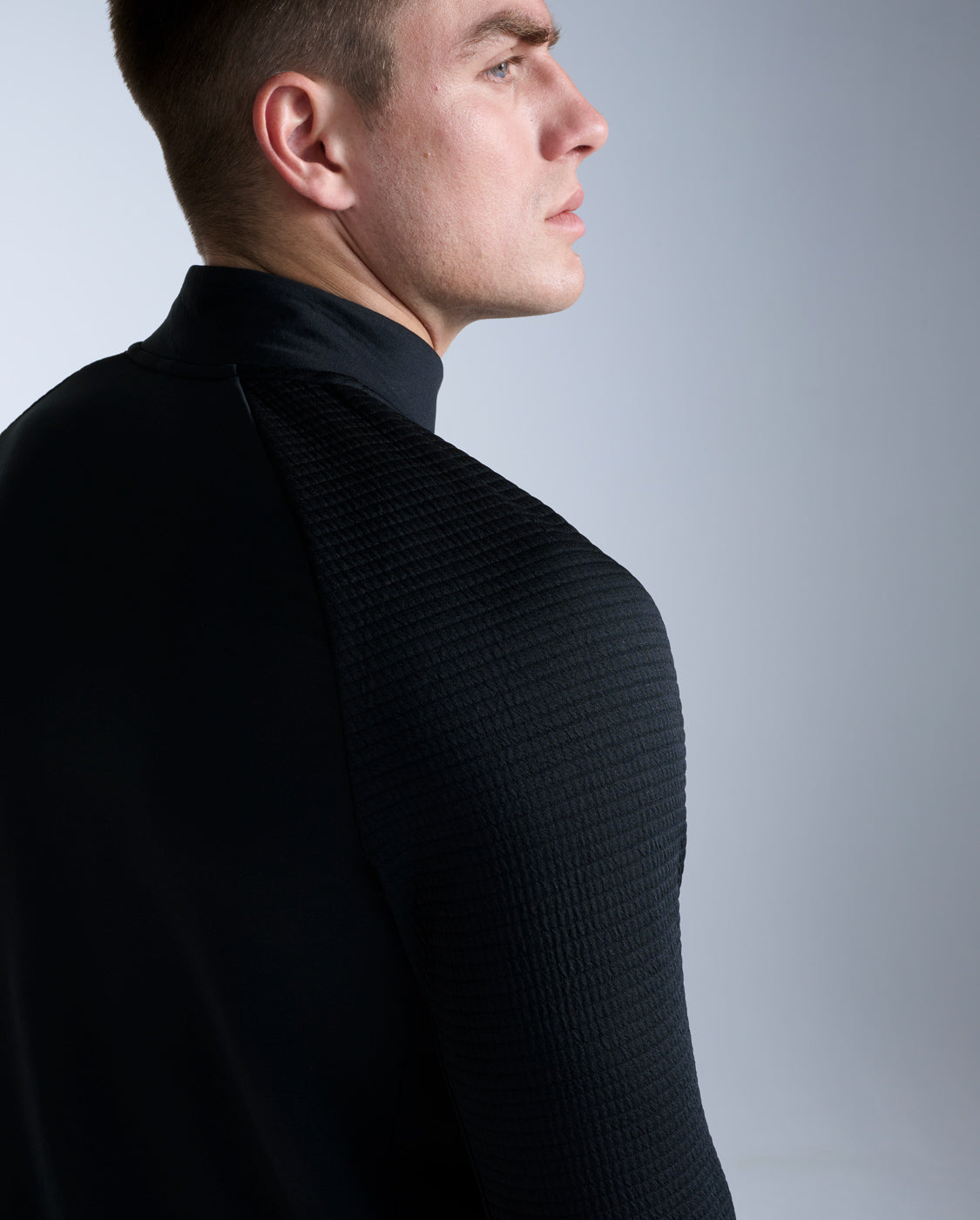 2xu-ignition-haptic-1-4-zip-felpa-running-uomo-nera-slim image 4