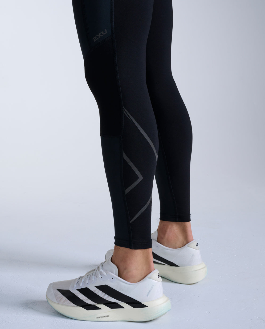 2xu-ignition-shield-compression-tights-nere-leggings-running-invernali-impermeab image 6
