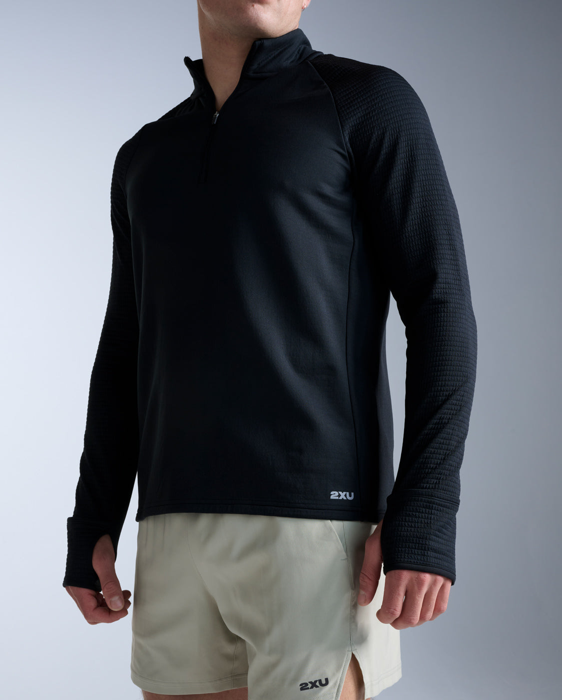 2xu-ignition-haptic-1-4-zip-felpa-running-uomo-nera-slim image 2